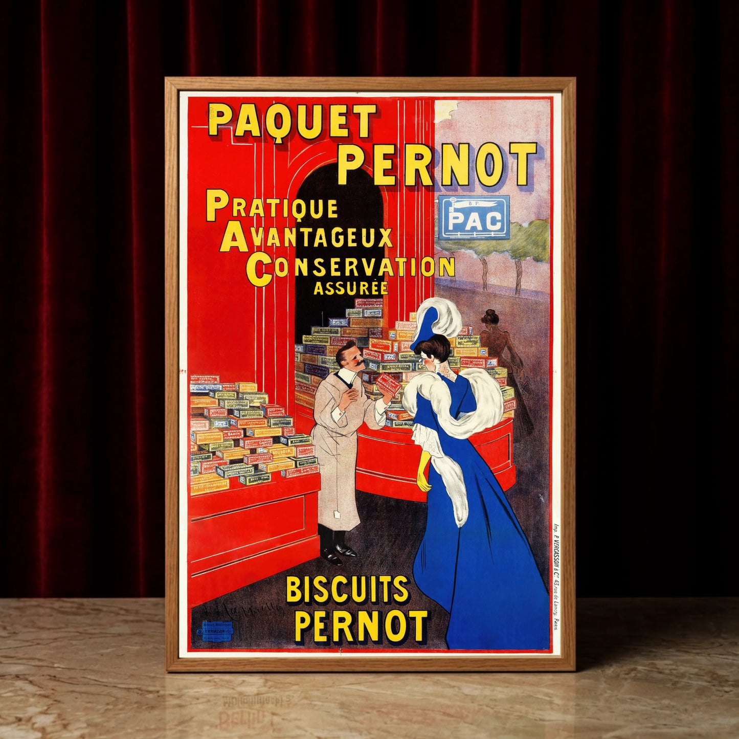 Detailansicht eines historischen Werbeplakats für Biscuits Pernot mit Fokus auf die farbenfrohen Verpackungen.
