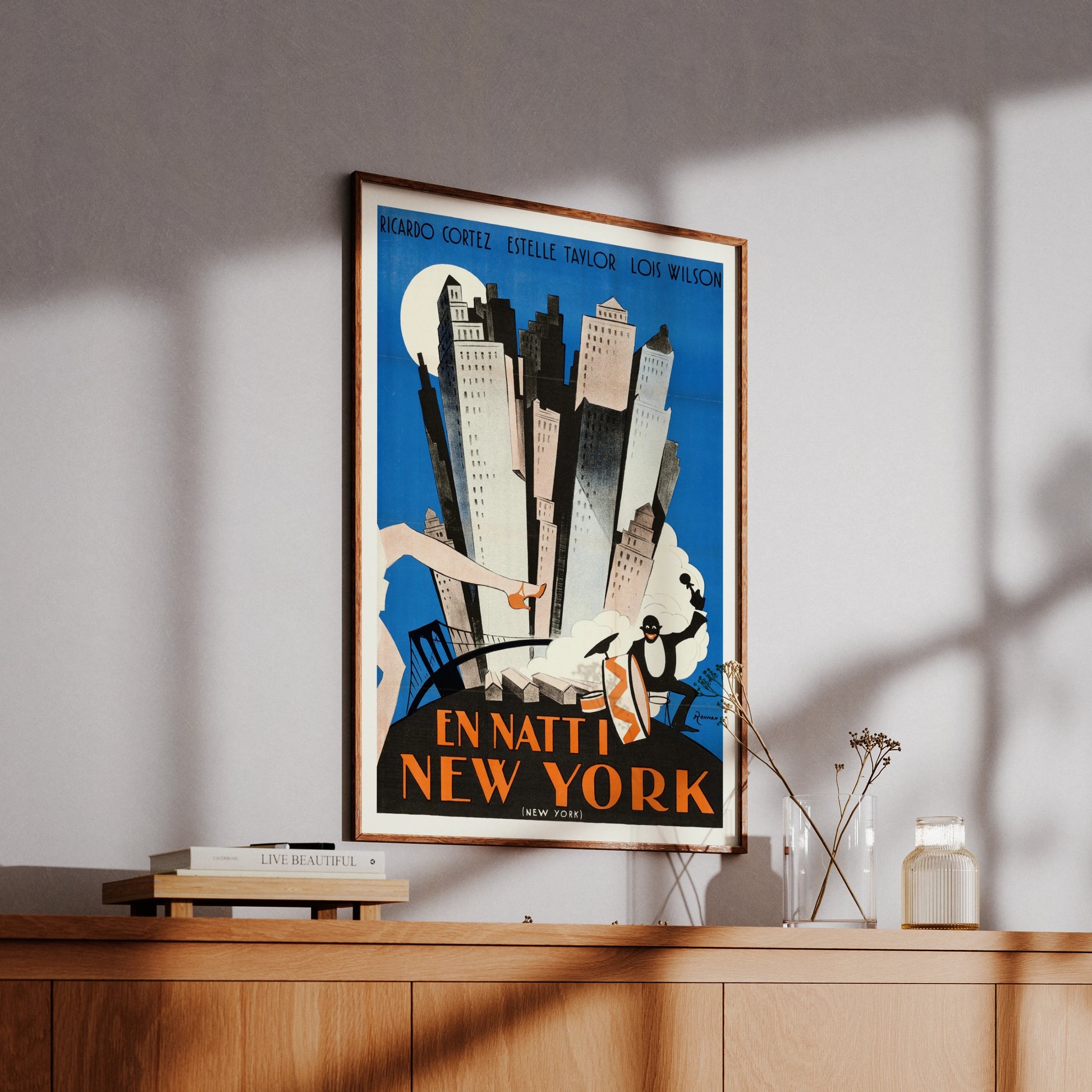 Schwedische Illustration von New York City bei Nacht mit Art Deco Gebäuden und Brooklyn Bridge.