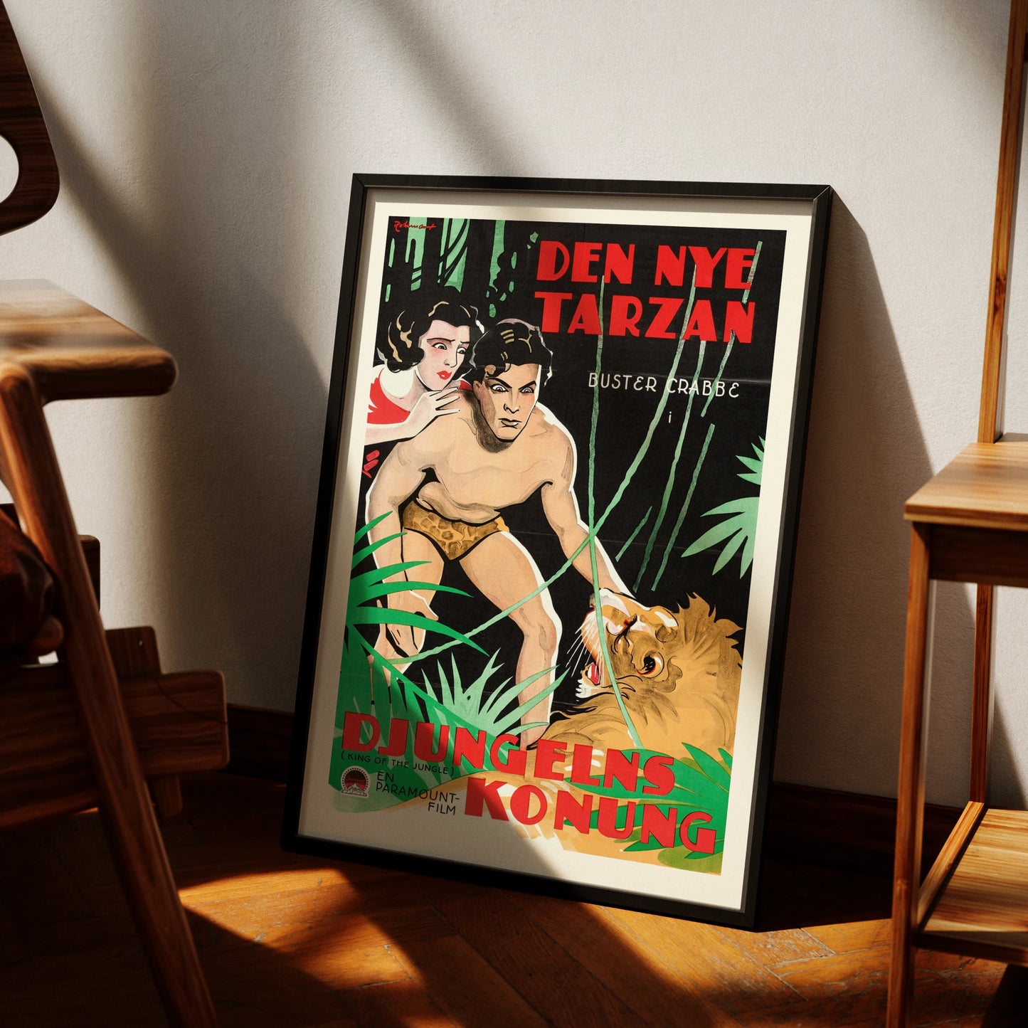 Schwedisches Filmplakat Djungelns Konung von 1933 mit einem Mann und einem Löwen.