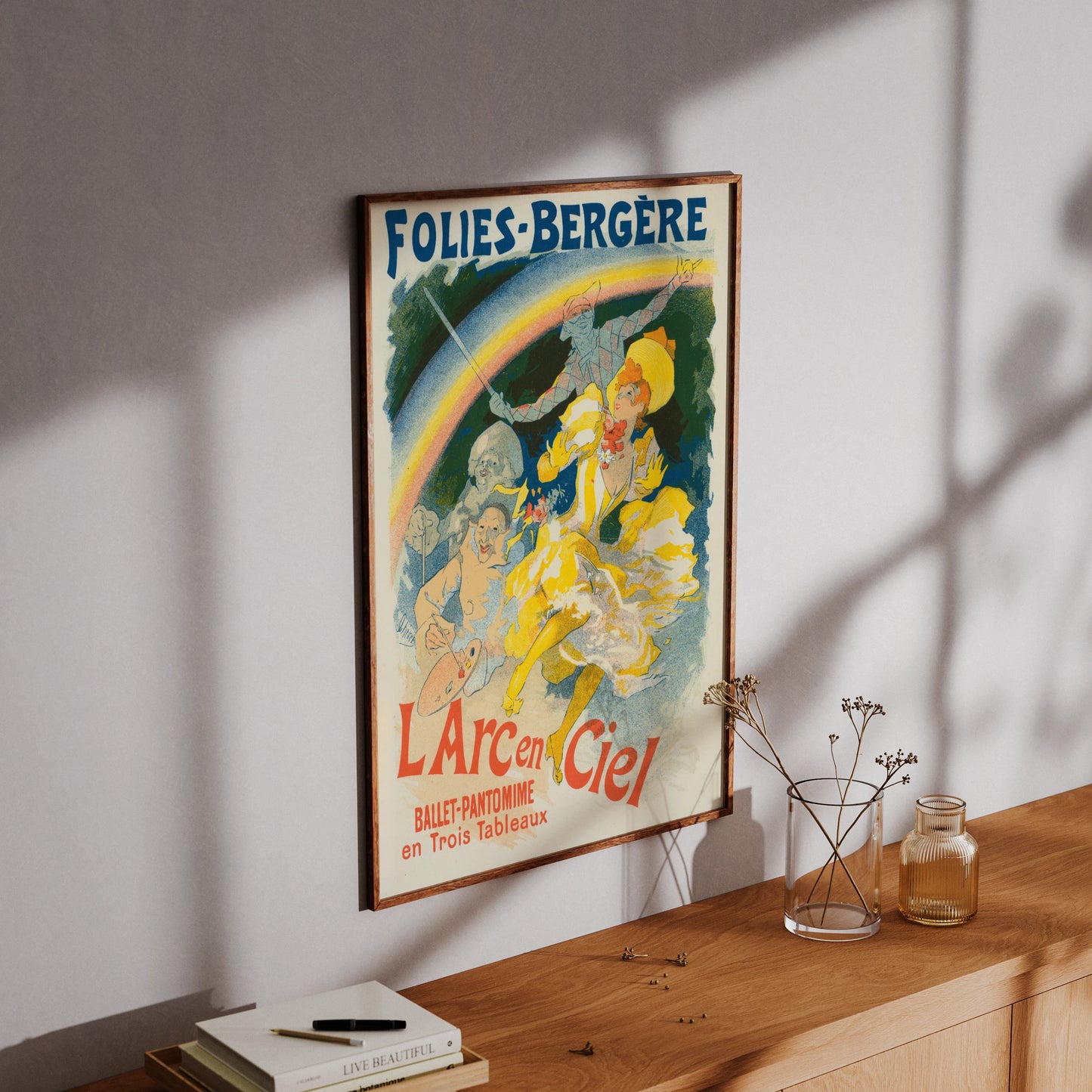 Historisches Folies-Bergère Plakat L'Arc-en-Ciel mit Regenbogen und Harlekin.