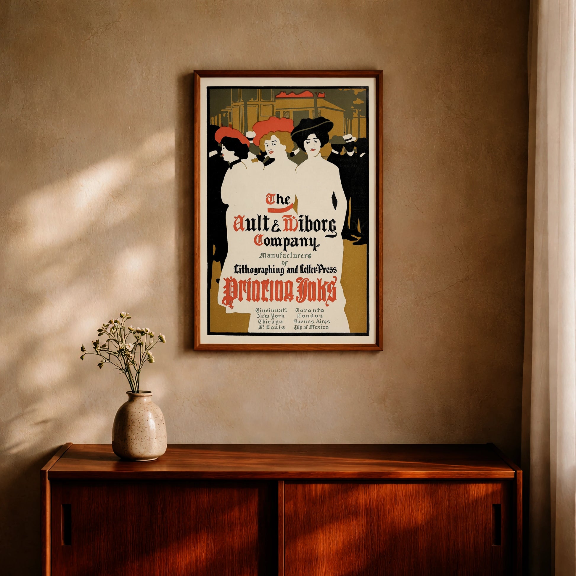 Art Nouveau Grafik in Orange, Schwarz und Ocker mit historischer Firmenschrift.